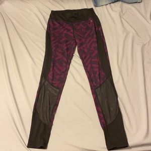 Purple part mesh workout pants.